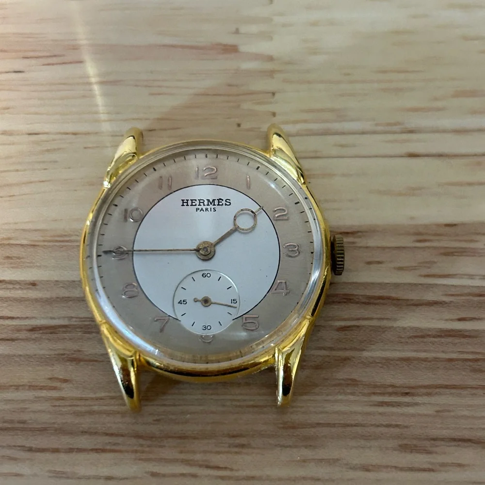 HERMES Paris “Moon Lugs” manual wind 33-34mm X 39mm, 17mm strap width.